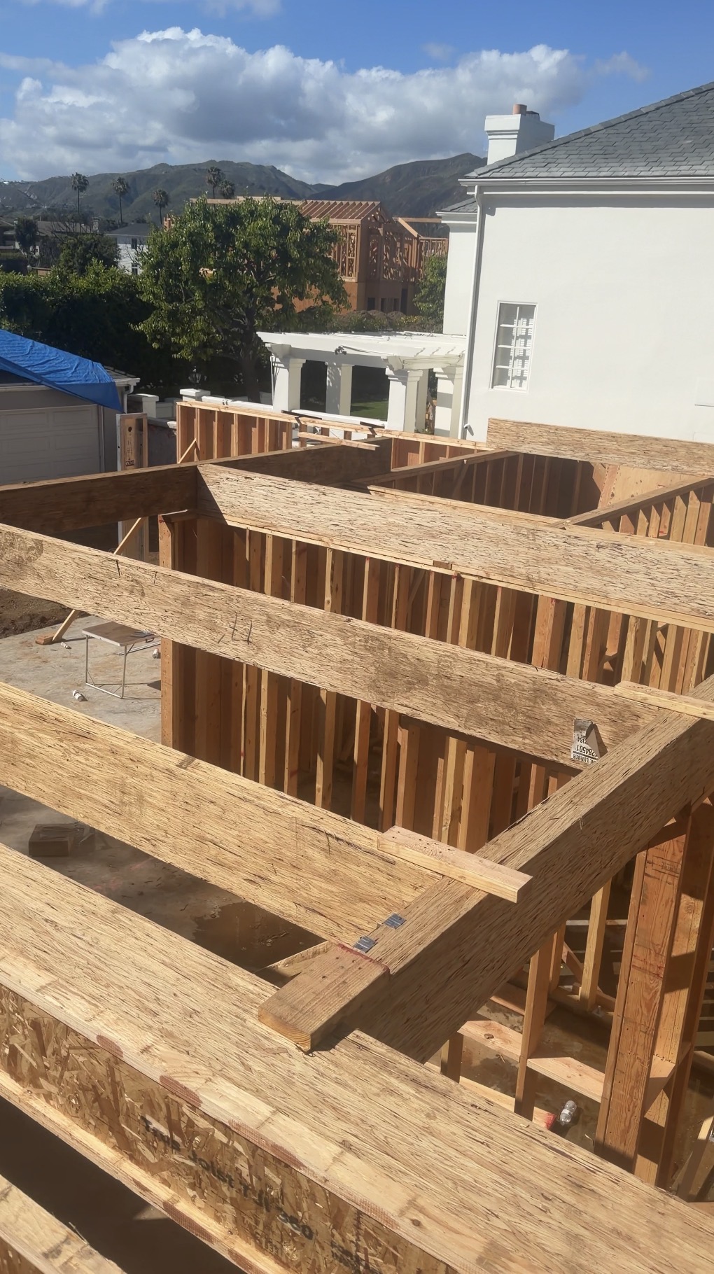 Engineered wood beams and structural framing connections